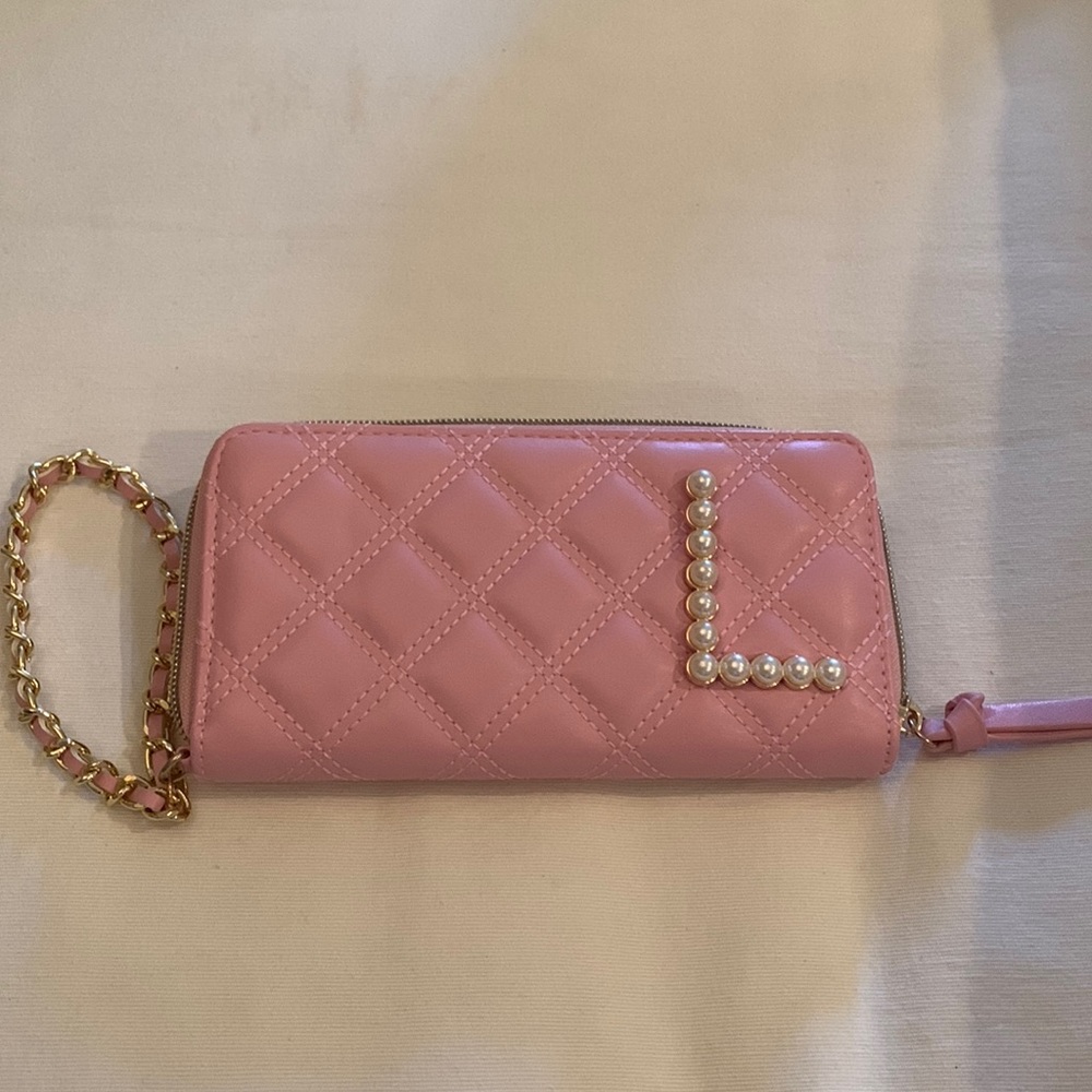 Pink quilted wristlet with pearl,  letter “L” on it. Never Used